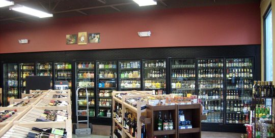 Interior of liquor store showing cold display cases